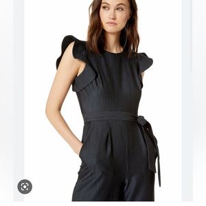 Calvin Klein belted BLU jumpsuit size 2. Flutter sleeves zipper up the back NWT
